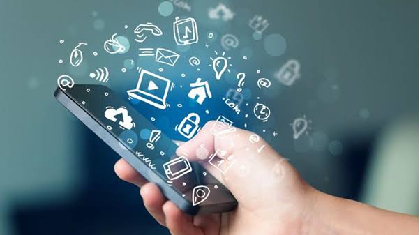 a hand holding a phone