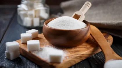 a bowl of sugar and sugar cubes