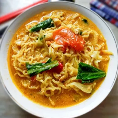 a bowl of soup with noodles and vegetables